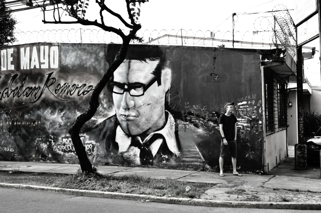 Luke and man street art Costa Rica - Charlie on Travel