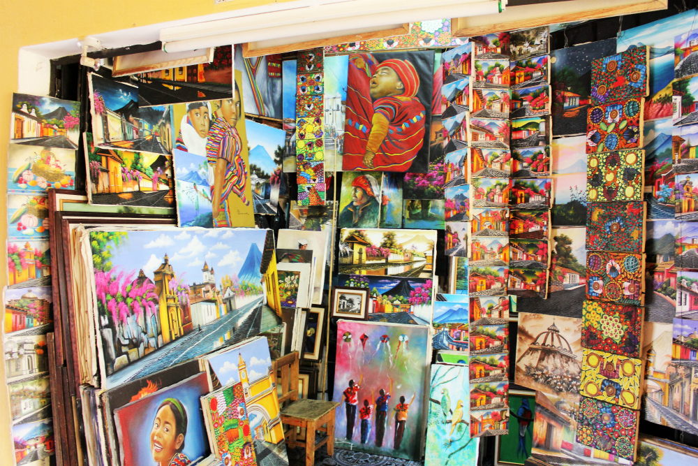 Artisan market oil paintings Antigua Guatemala - Charlie on Travel
