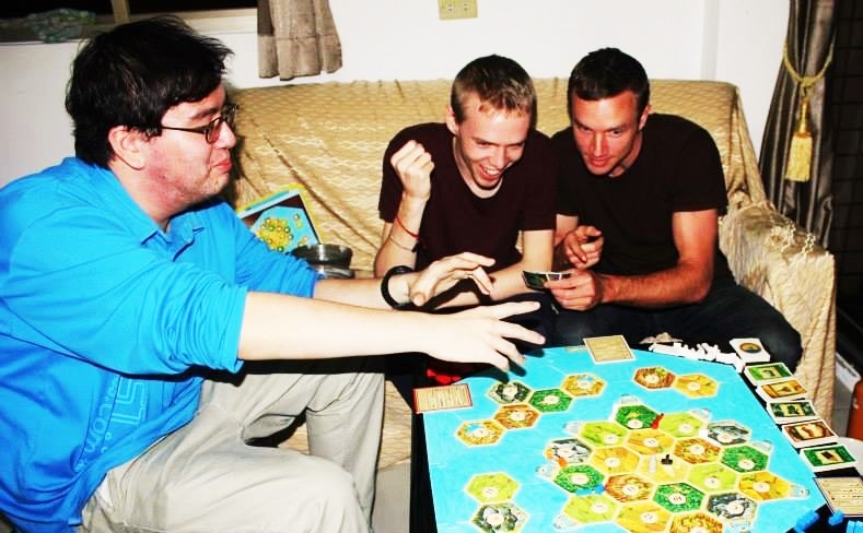 Tu Teaching in Taiwan - dominating settlers of catan - charlie on travel