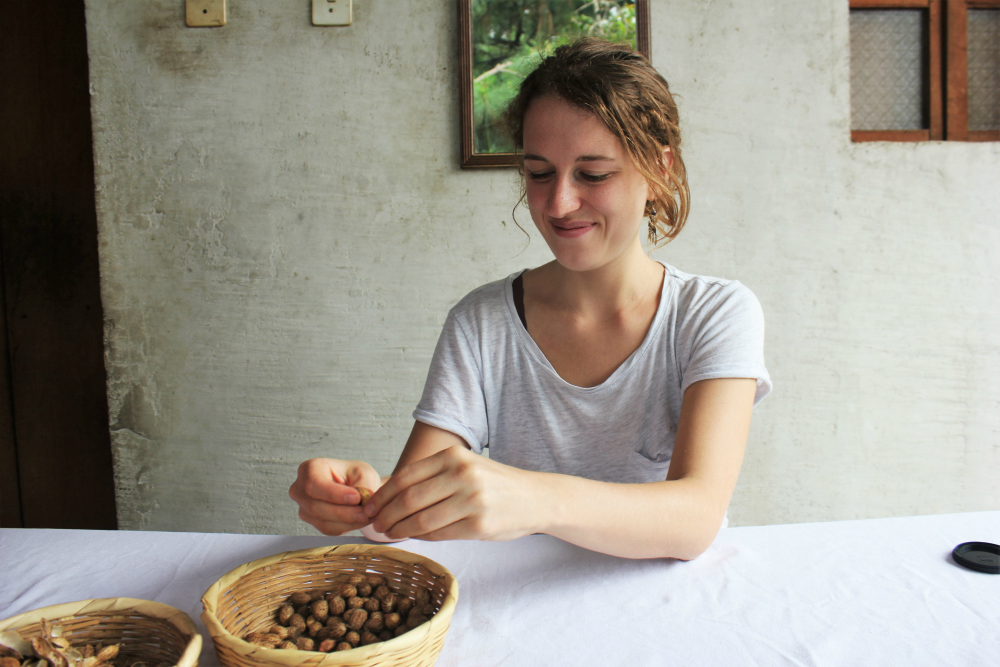 peanut-butter-workshop-with-de-la-gente-antigua-guatemala-charlie-on-travel-charlie-shelling-the-peanuts
