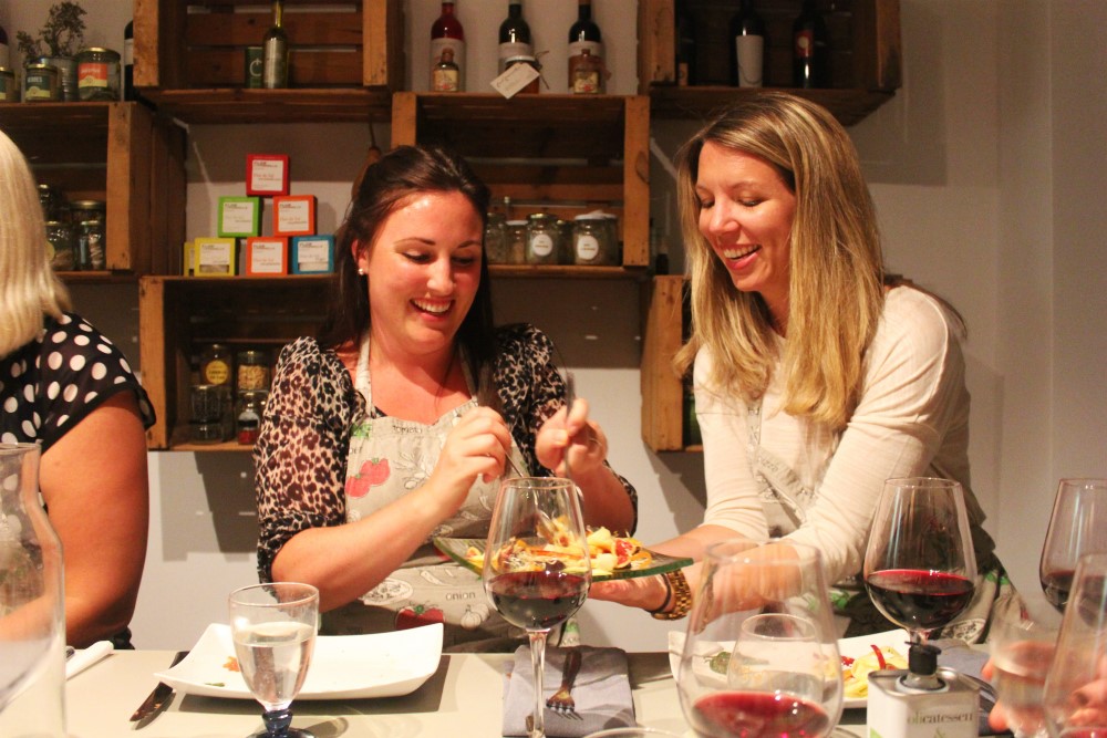 Sharing food at Barcelona cooking class with Barcelona Slow Travel - Charlie on Travel