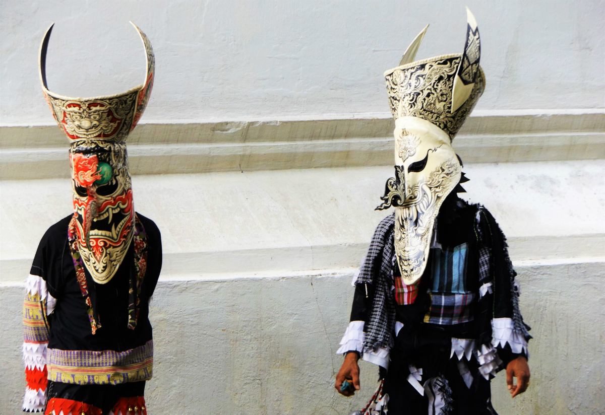 In their Masks at Phi Ta Khon Festival Thailand - Loei - Charlie on Travel