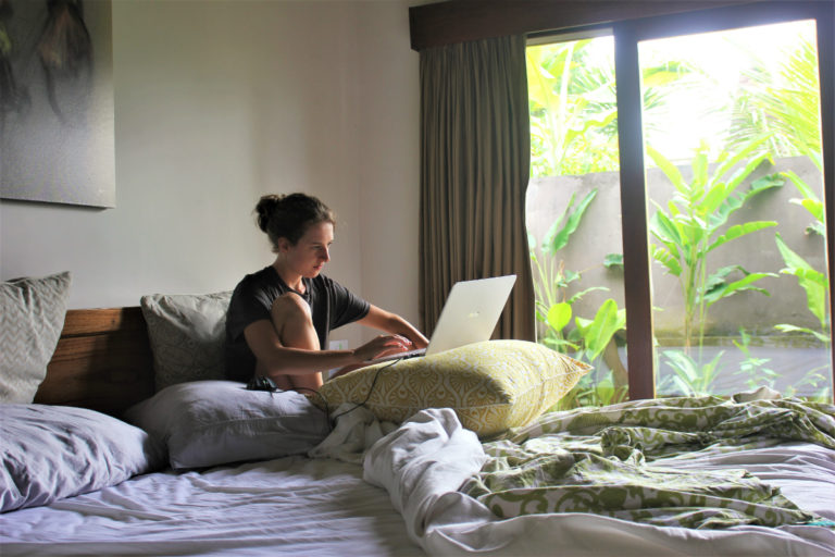 Charlie working on a laptop in Ubud, Bali