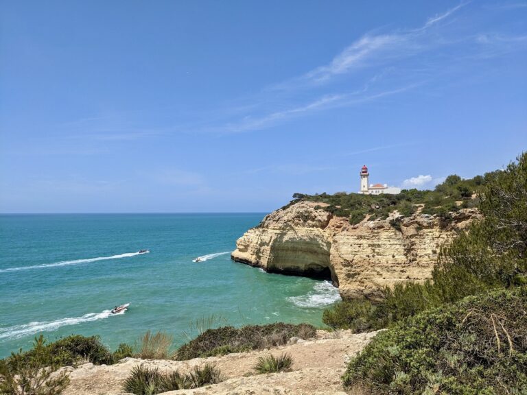 The Seven Hanging Valleys Trail passing Alfanzina Lighthouse along the Algarve coast