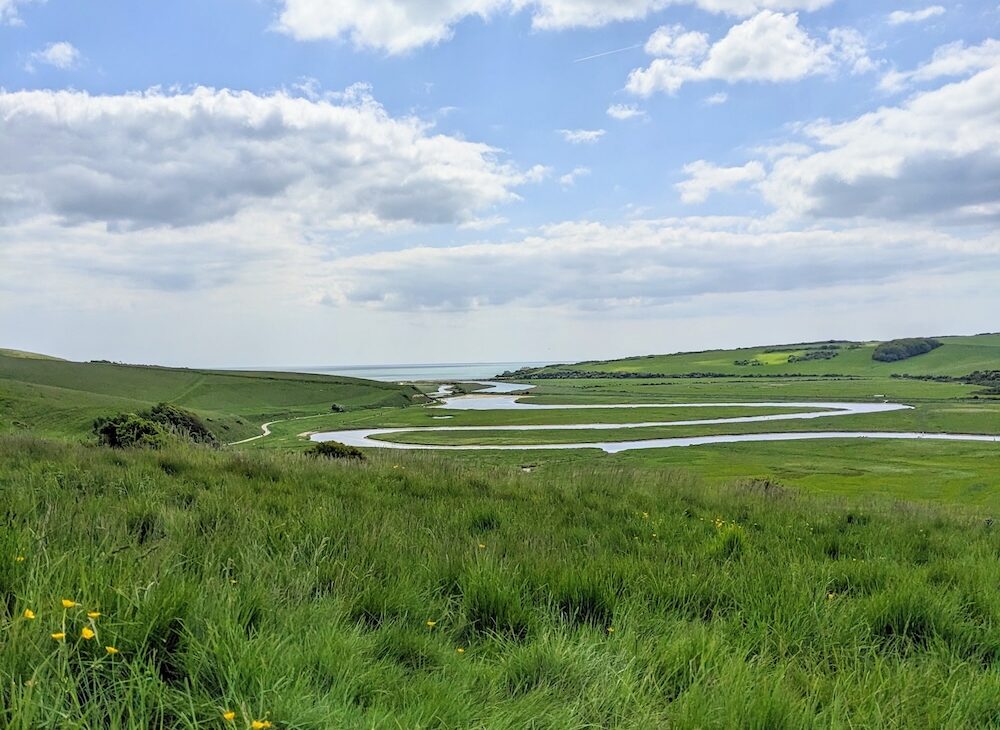 The River Cuckmere meandering through the valley below the Seven Sisters cliffs
