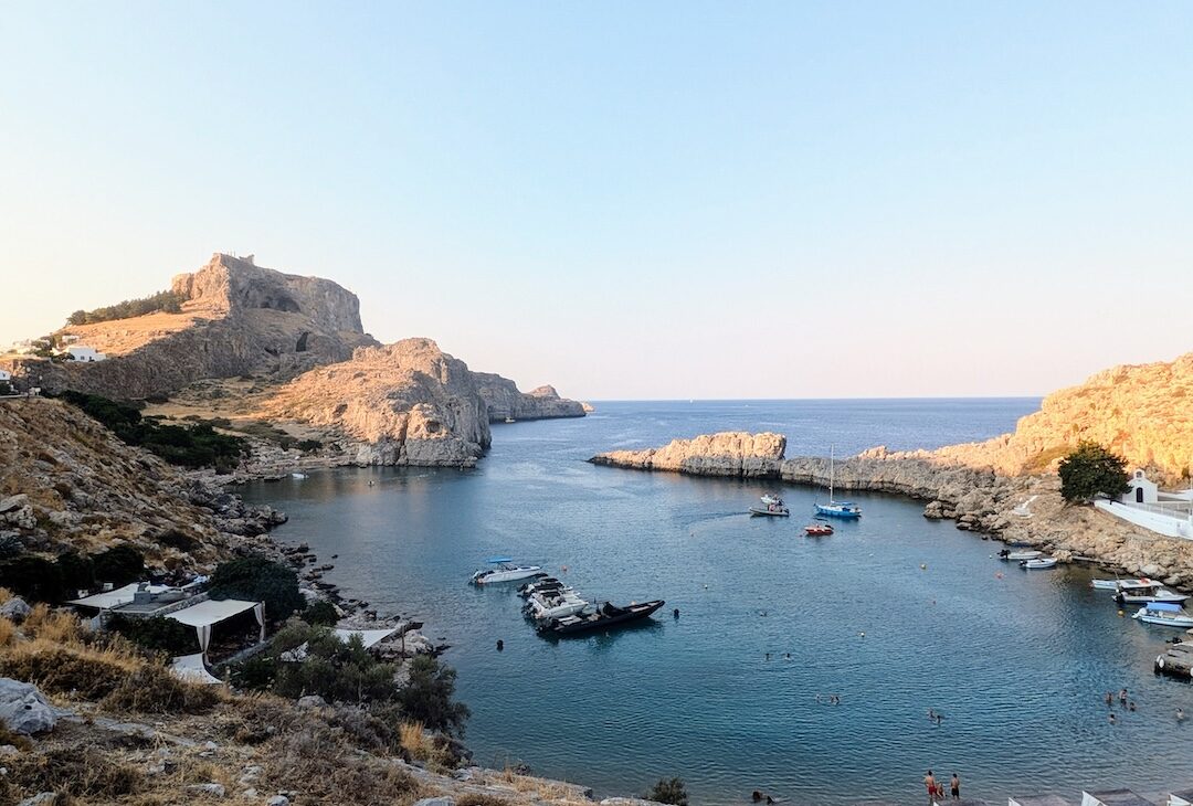 The near-enclosed heart shape of St Paul's Bay seen from above, Lindos