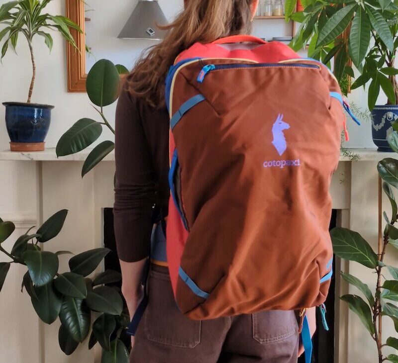 Charlie wearing the Cotopaxi Allpa 50L travel pack