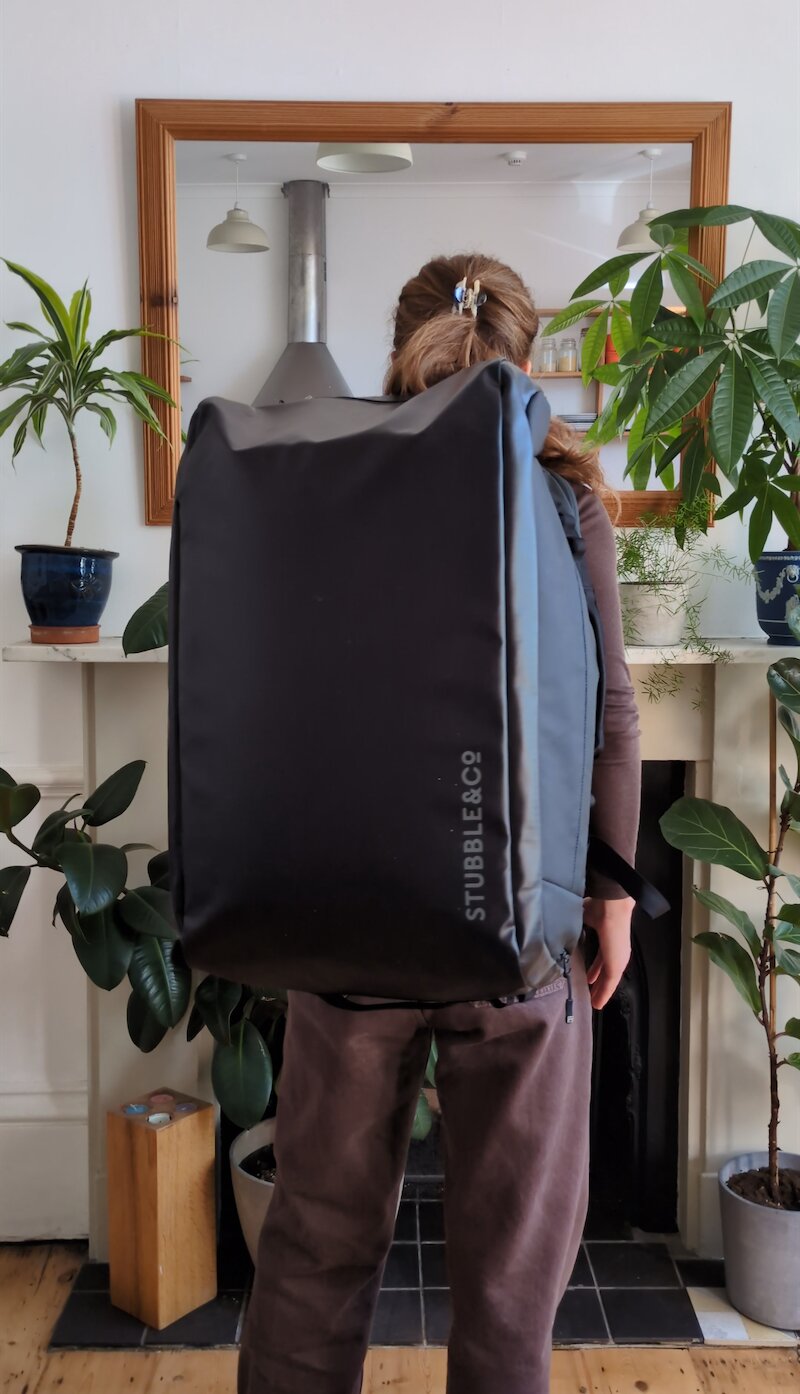 Charlie wearing the Stubble & Co Kit Bag 65L